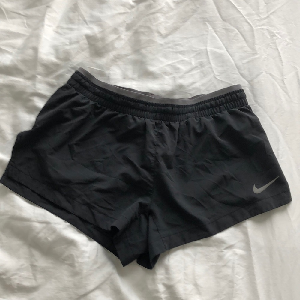 Nike dry fit workout shorts. 2” inseam. Lined. Has a Back pocket with a zipper.